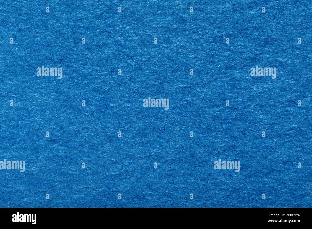 Blank rough surface macro view. Blue paper texture background. Stock Photo