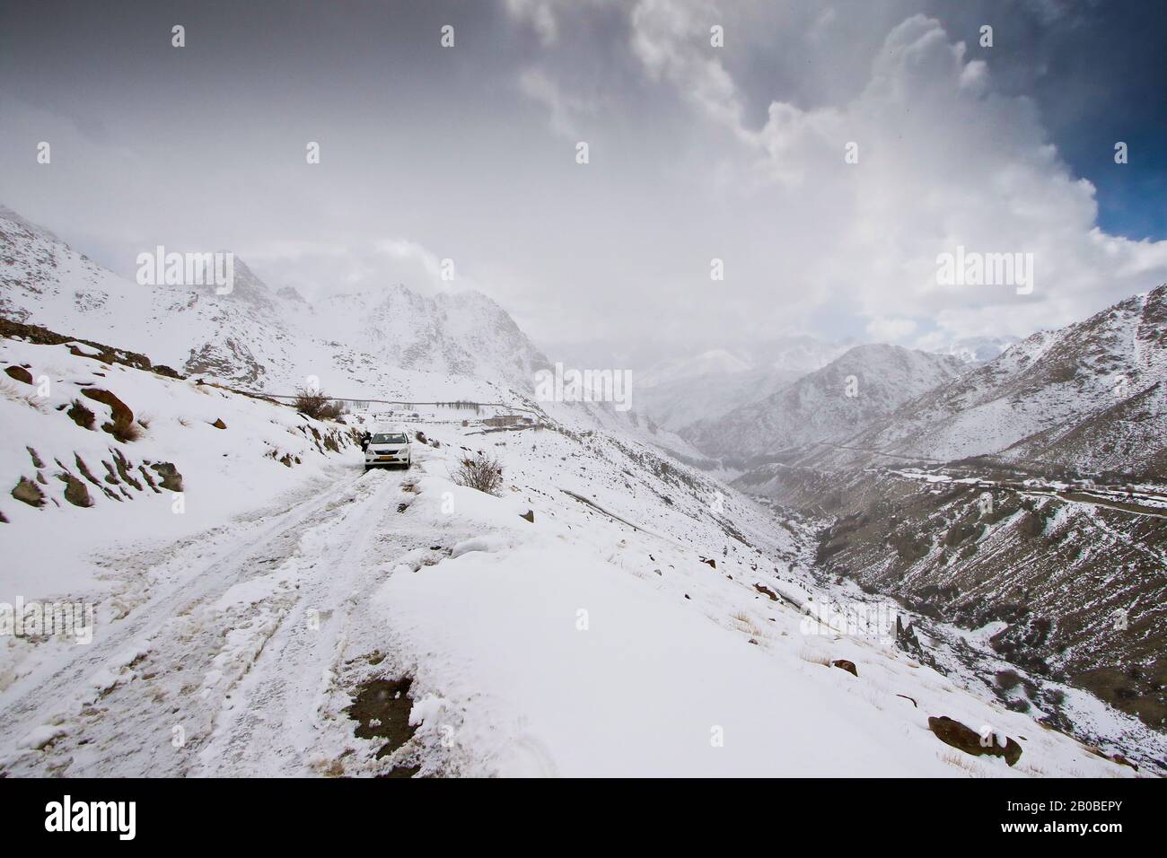 Tourist expedition searching snow leopard in Ulley valley. Ladakh ...