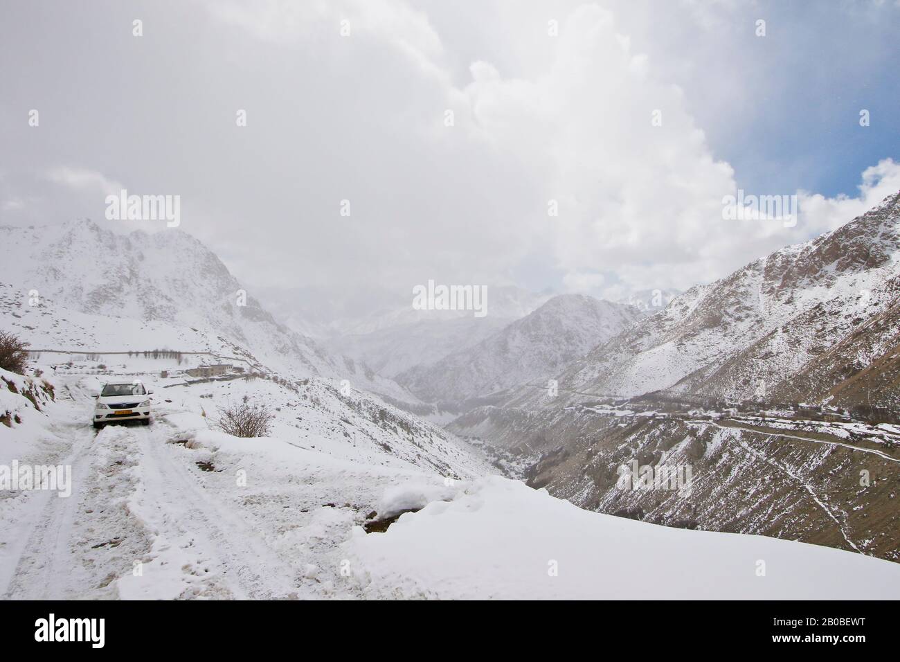 Tourist expedition searching snow leopard in Ulley valley. Ladakh ...