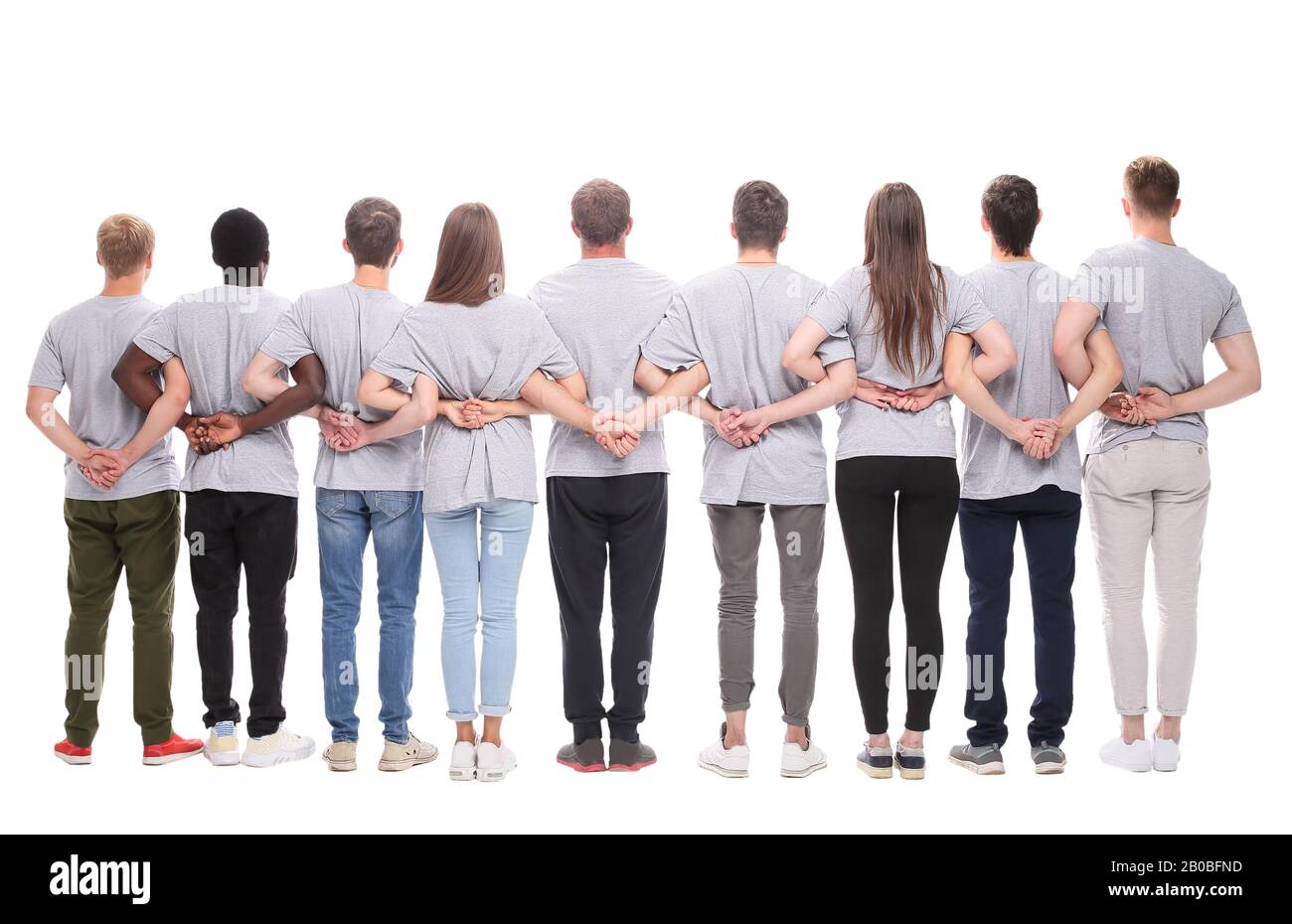 rear view. a large group of motivated young people Stock Photo - Alamy