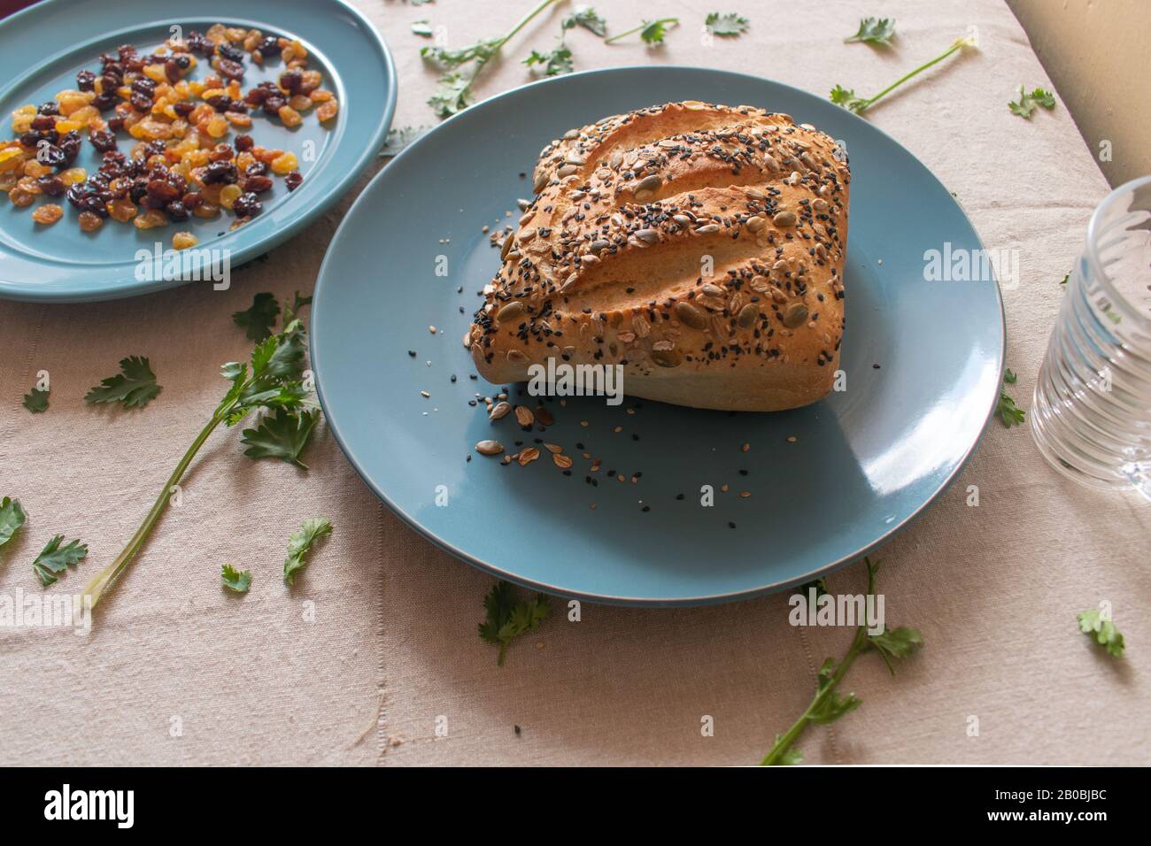 paved bread on a blue plate. horizontal view Stock Photo