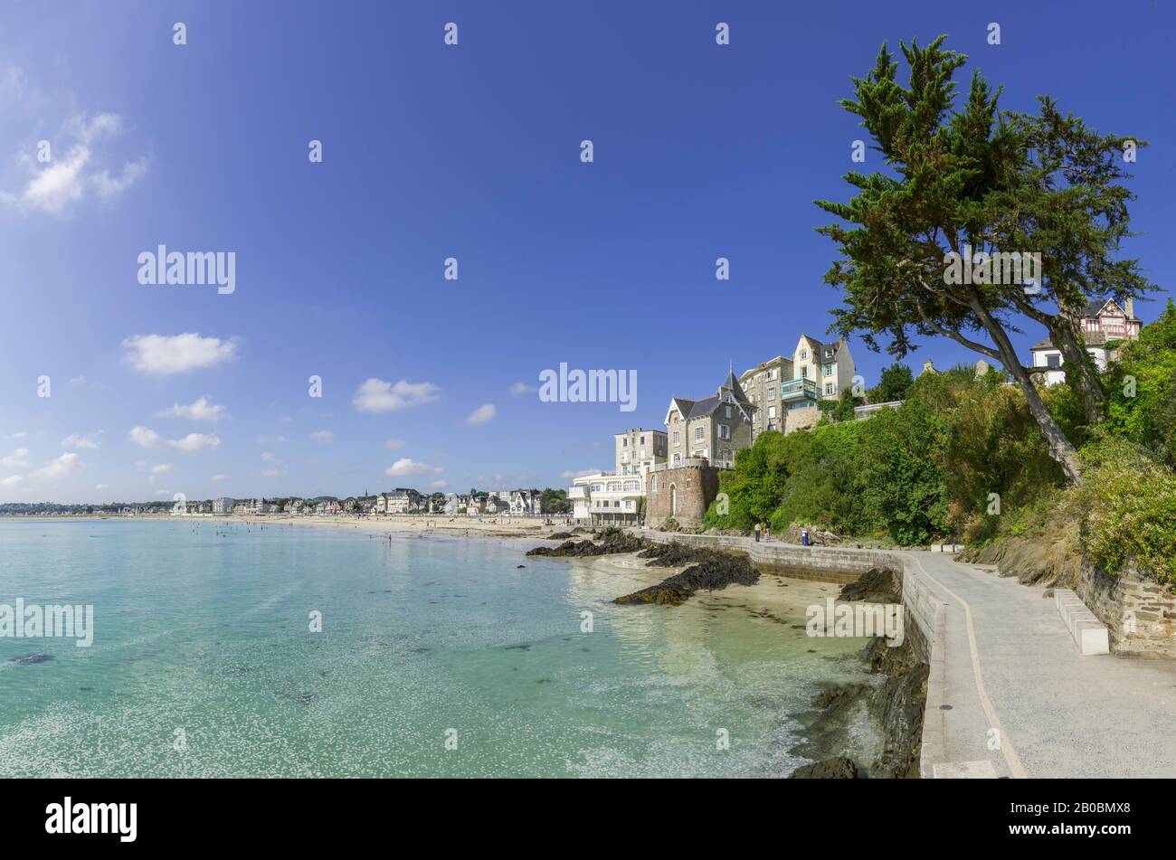 Seaside resort with beach and promenade path, Saint-Cast-le-Guildo ...