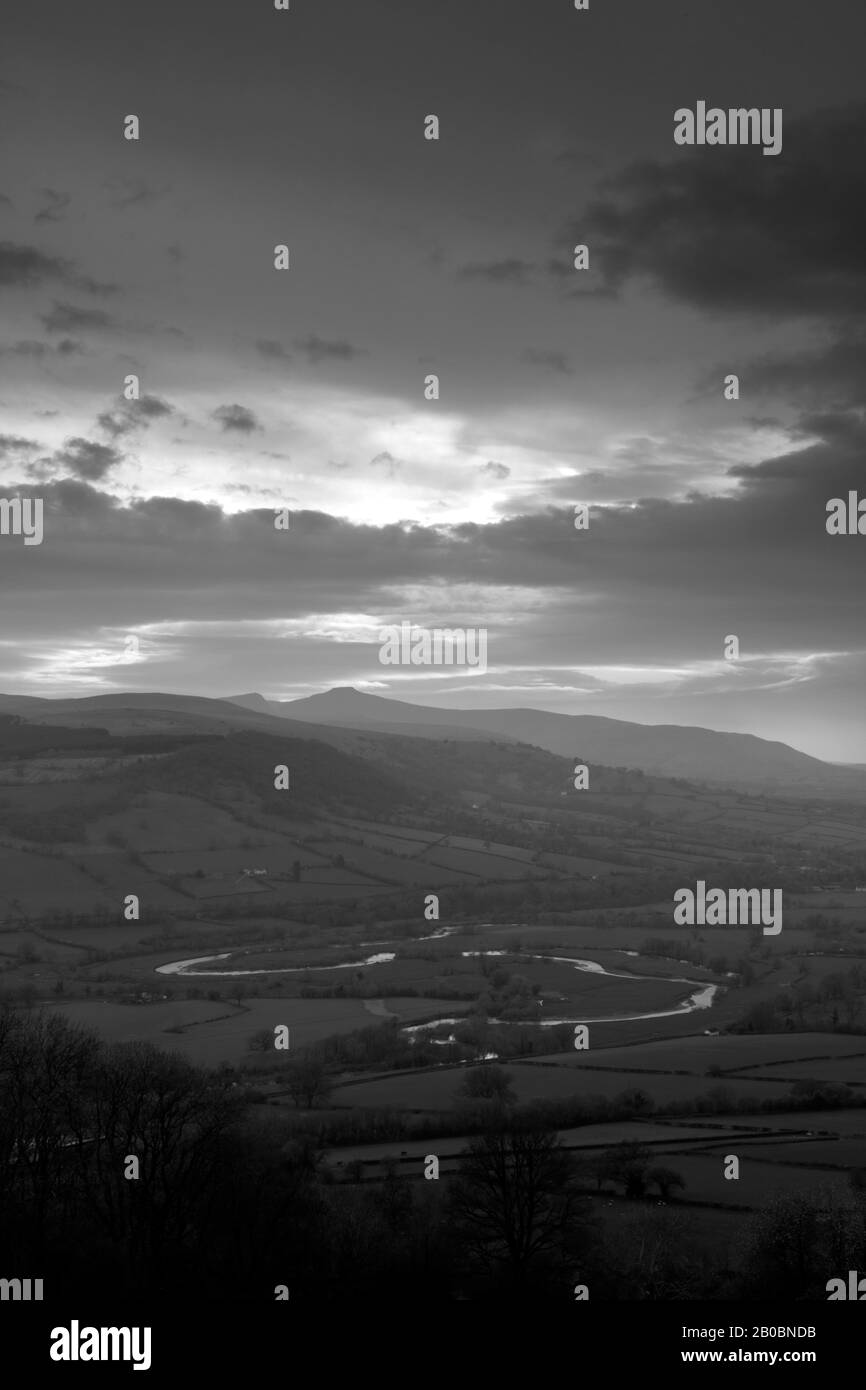 View across the River Usk at Pencelli to the peak of Pen y Fan peak, Brecon Beacons, Wales, UK Stock Photo