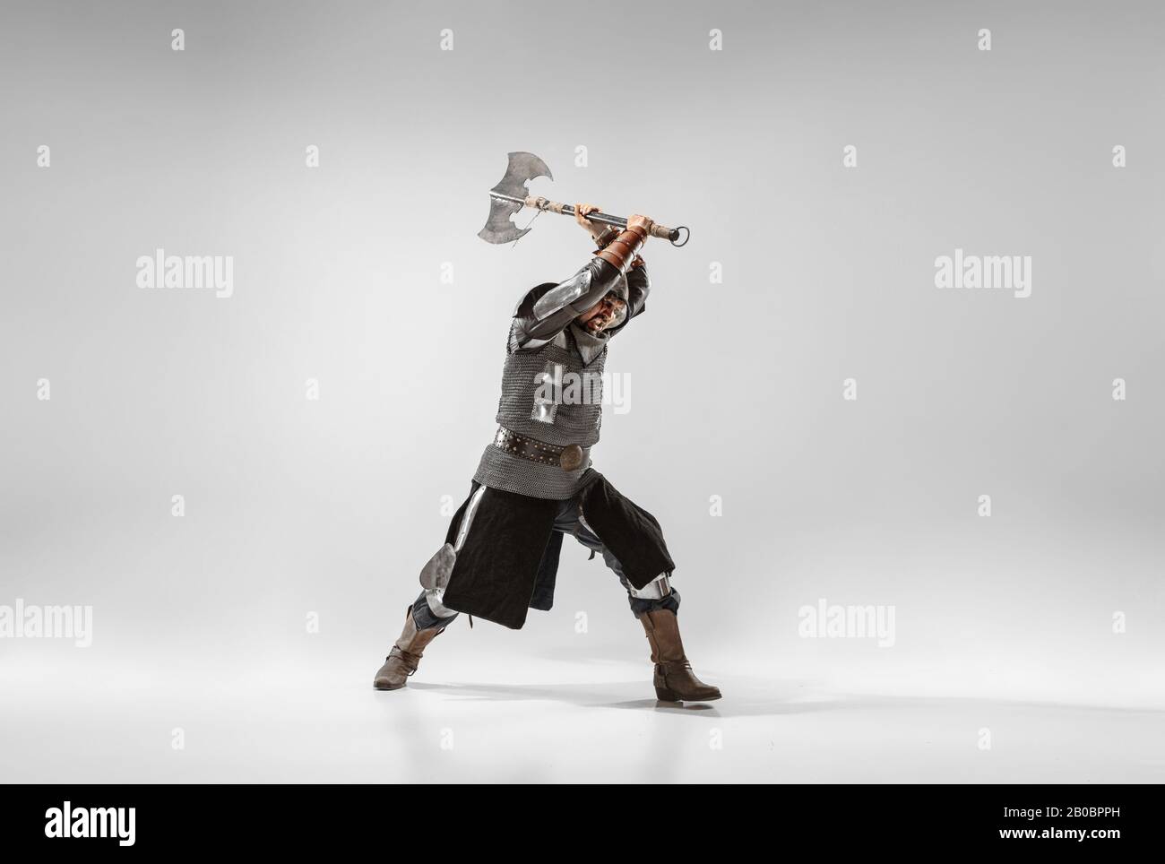 Brave armored knight with professional weapon fighting isolated on ...