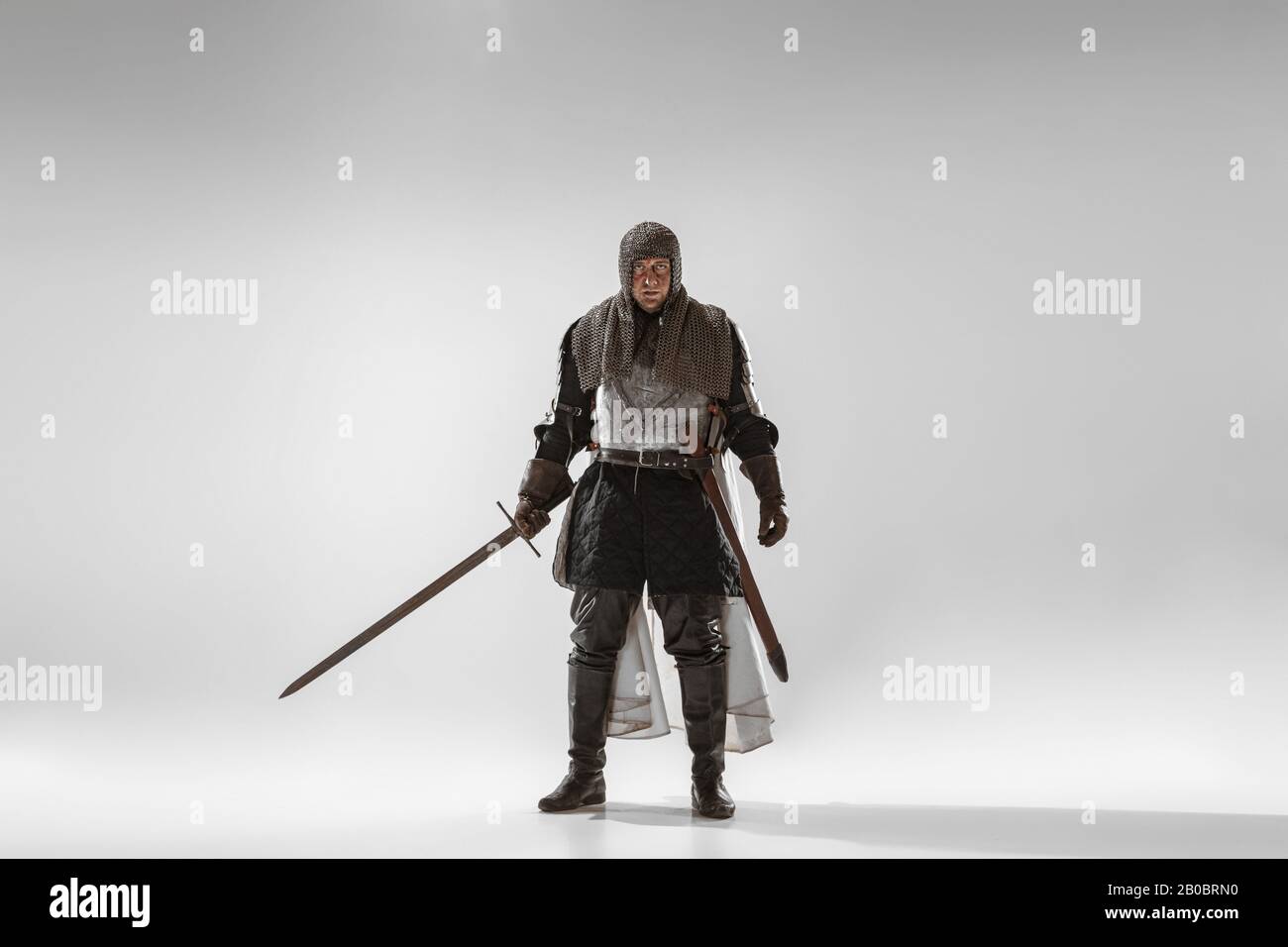 Brave armored knight with professional weapon fighting isolated on ...