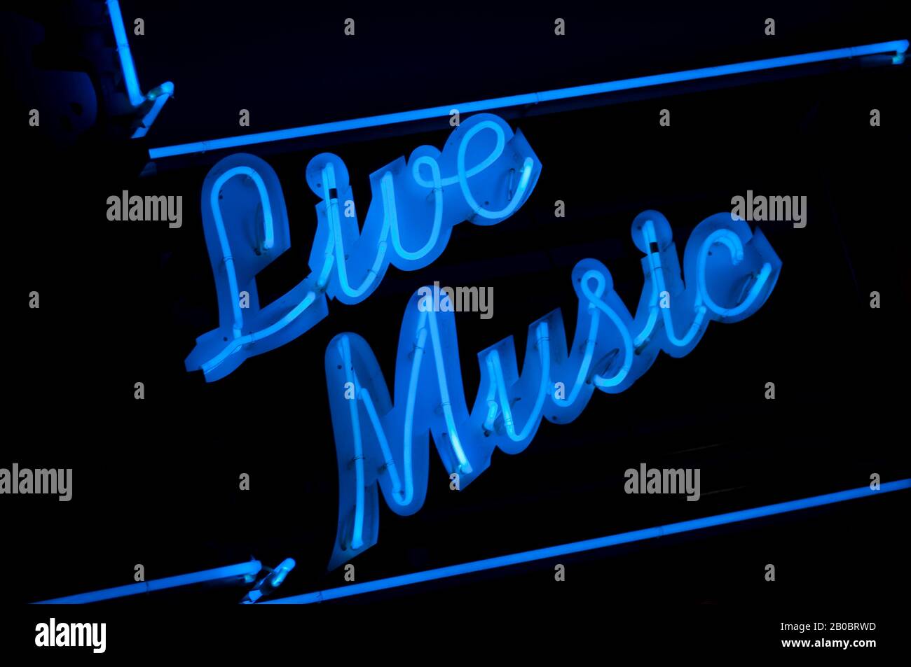 Blue Live Music neon sign nightlife message on black background at