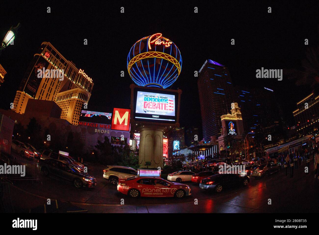 Las Vegas, United States. 20th Feb, 2020. An advertisement for the Nevada debate shows on a screen the Paris Theater after the debate in Las Vegas. Credit: SOPA Images Limited/Alamy Live News Stock Photo