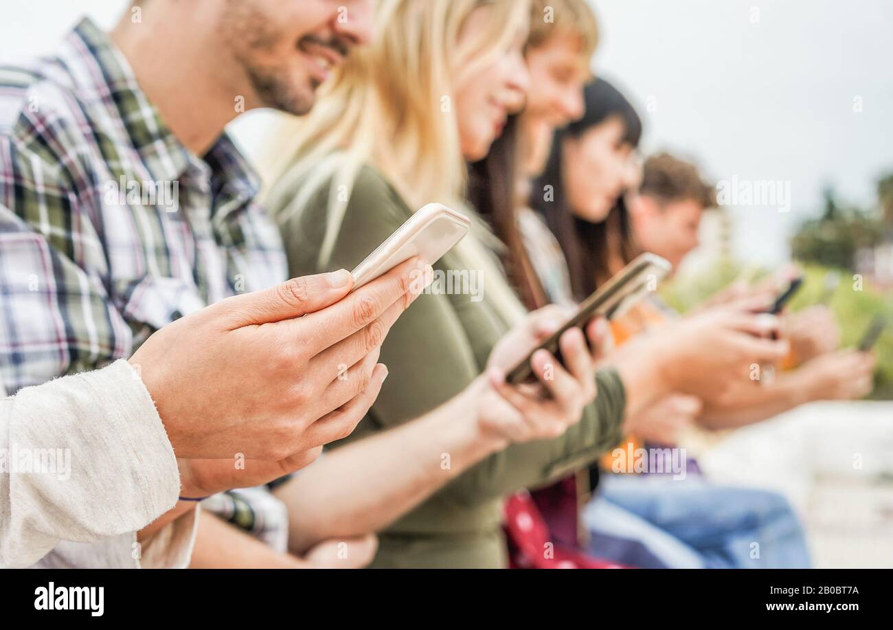 Group of friends watching smart mobile phones - Teenagers 