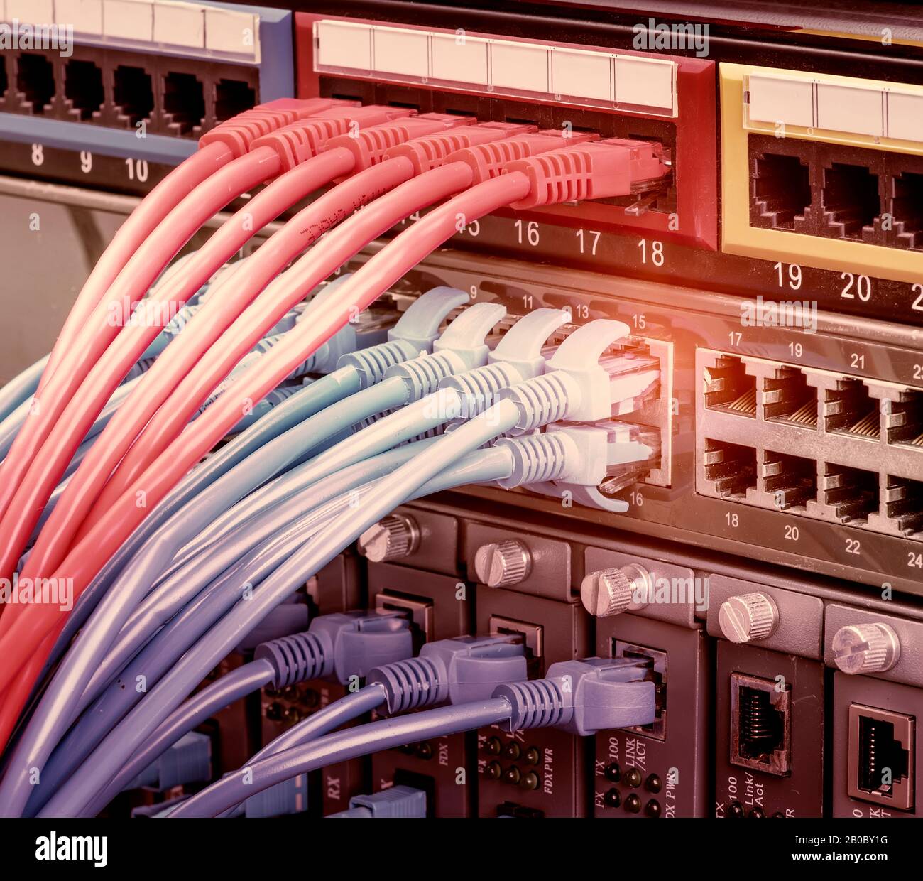 Network cable in switch and firewall in cloud computing data center server rack Stock Photo