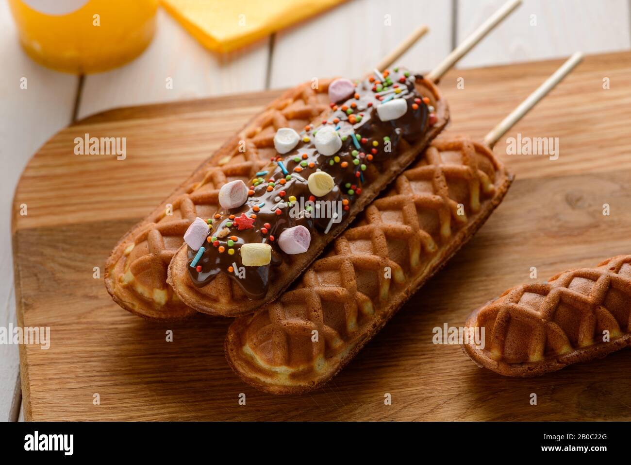 Beautiful corn dogs. Usual snack and its dessert version Stock Photo