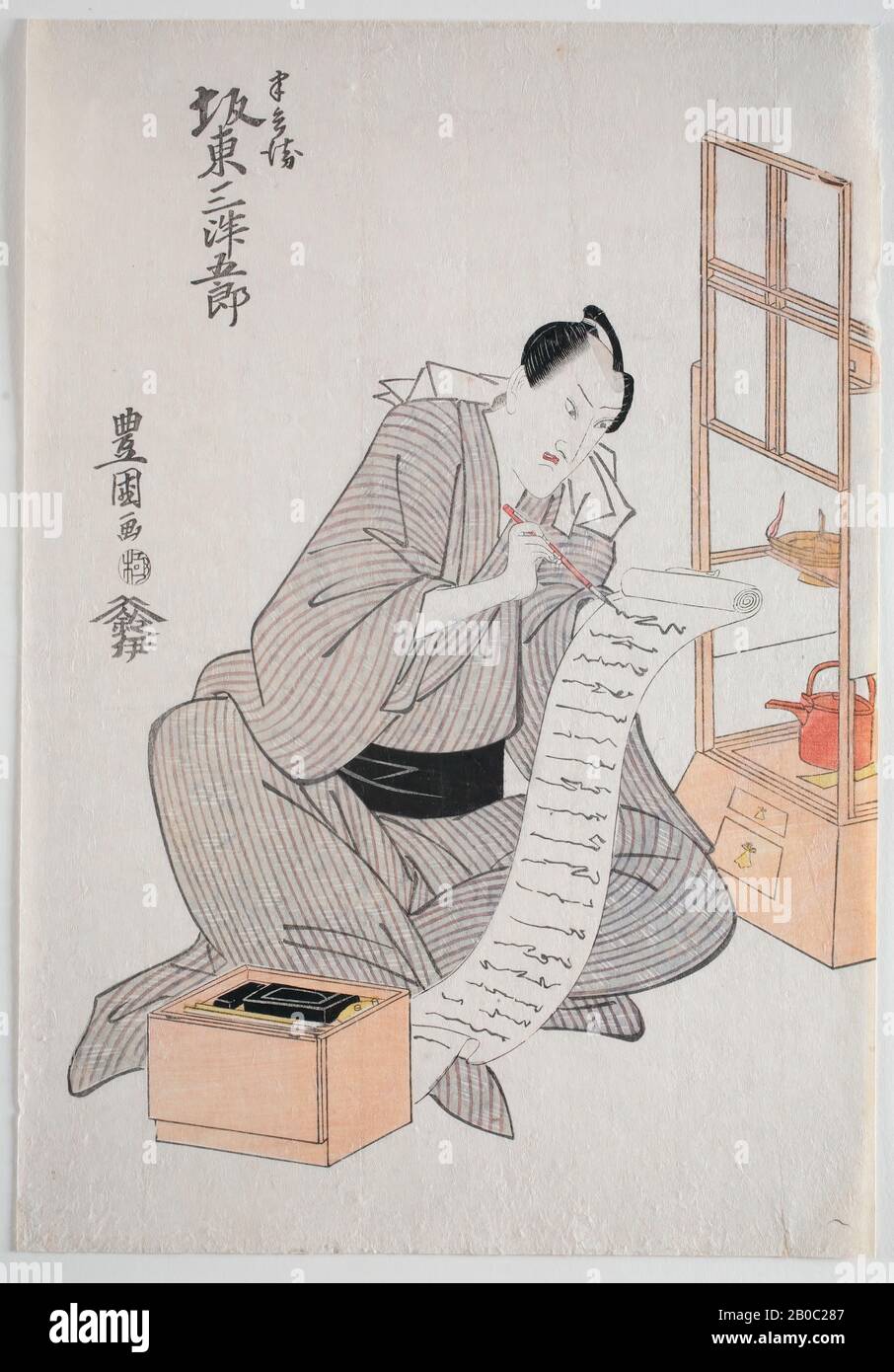 Toyokuni, Seated Gentleman Writing on a Long Scroll, 1777-1835, color woodcut on paper, 14 5/8 in. x 10 1/8 in. (37.2 cm x 25.72 cm Stock Photo