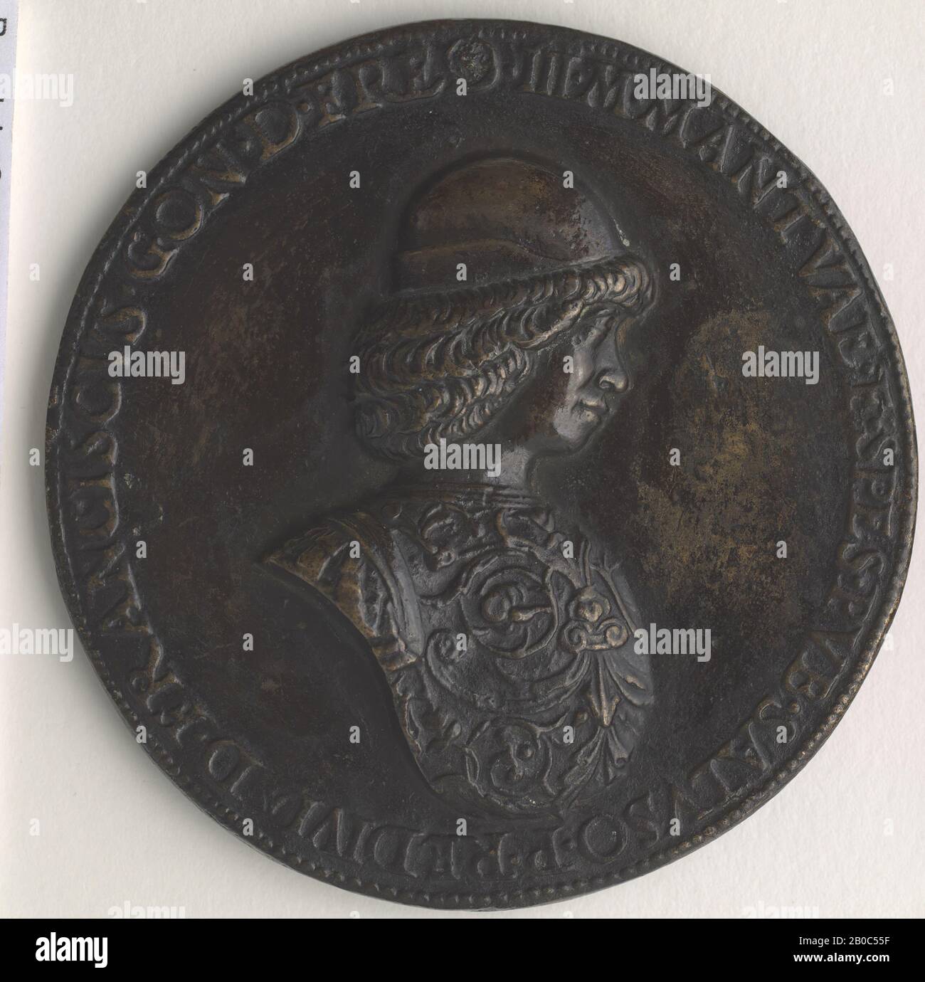 Bartolommeo Melioli, Francesco II Gonzaga (1466-1519), later fourth Marquess of Mantua, 1484, bronze, black patina, 2 13/16 in. (7.1 cm.), This early medal depicts Francesco II Gonzaga (1466-1519), the fourth Marquess of Mantua. A personification of Prudence holding a muzzle (a Gonzaga family device) is on the reverse, perhaps presenting the teenage Francesco with an important lesson: govern with the virtues of restraint and self-control. As the popularity of medals spread into Northern Italy during the latter half of the fifteenth century, schools of medalists formed in major urban centers wh Stock Photo