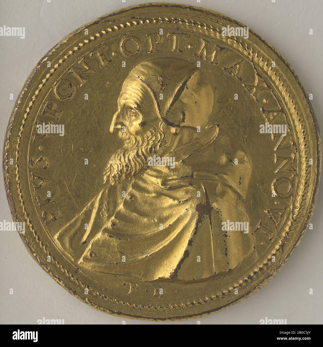 Gian Federigo Bonzagni, Pius V (1504-1572), Pope 1566-1572, The Battle of Lepanto, 1571, gilt, copper, 1 7/16 in. (3.7 cm.), This medal was specially made to celebrate the Holy Alliance's decisive naval victory over the Ottoman Turks at Lepanto on October 7, 1571, which was cause for rejoicing throughout Spain and Italy. The reverse depicts the battle with a figure of God in the heavens striking the enemy. The reverse inscription references the Latin excerpt from Exodus 15:6: Thy right hand, O Lord, hath dashed in pieces the enemy Stock Photo