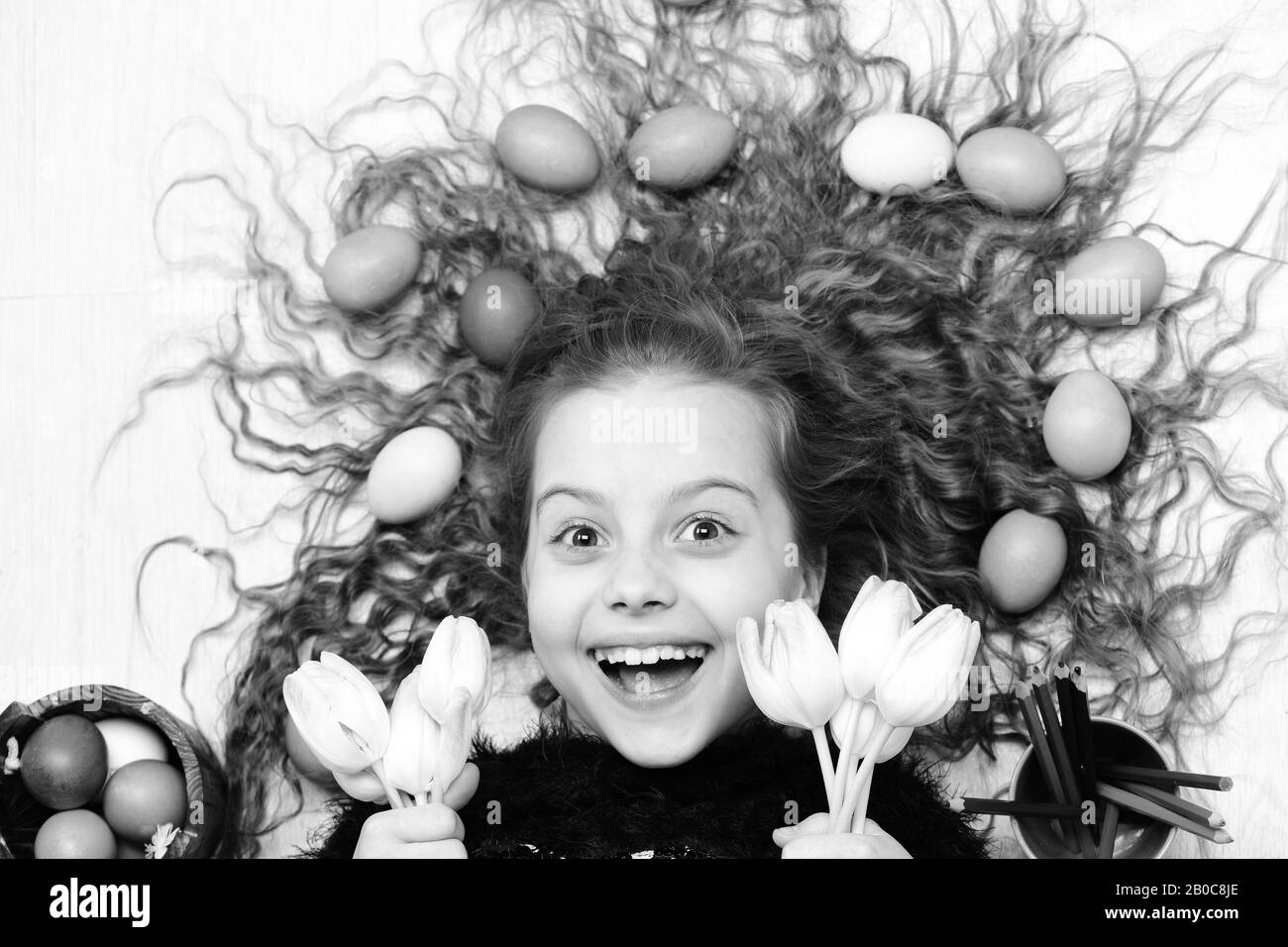 feelings and emotions, small child, happy girl with colorful easter