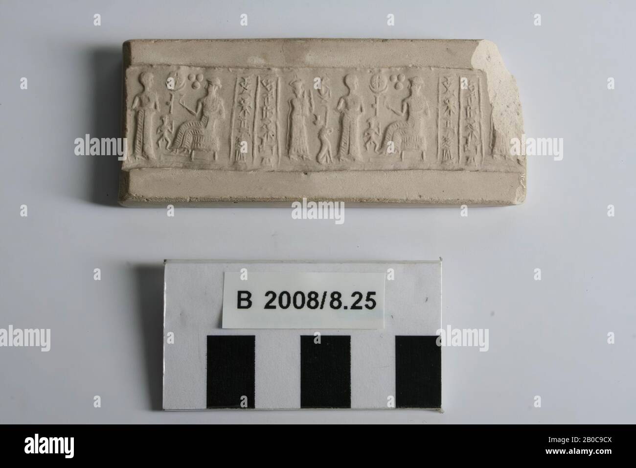 Ancient Near East, imprint, cylinder seal, plaster, 3.5 x 8.7 cm, modern Stock Photo