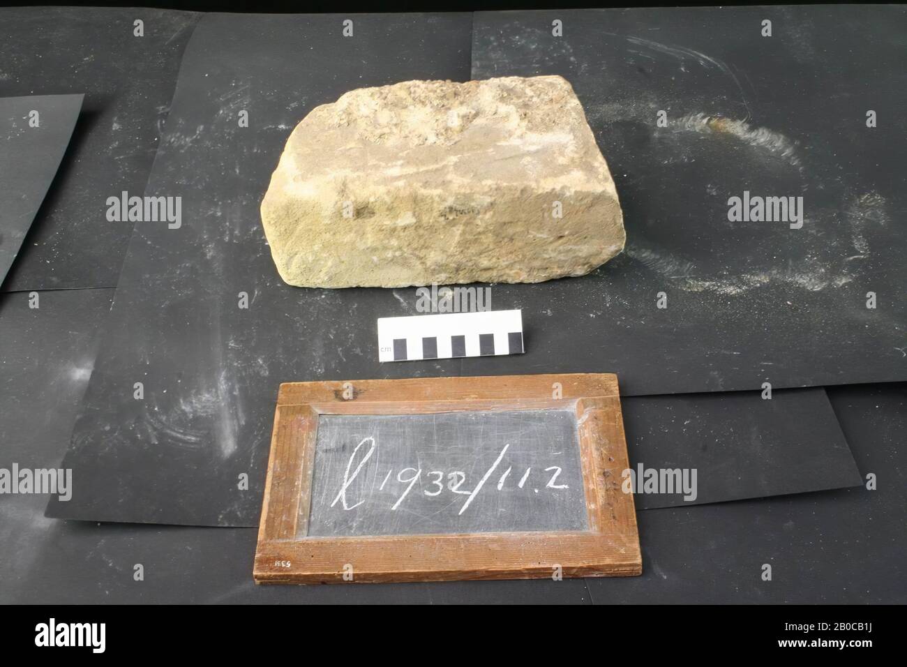 Fragment of limestone with mortar remains, fragment, stone, limestone, mortar, 25 x 14 x 10 cm, 5 kg, roman, Netherlands, Limburg, Voerendaal, Voerendaal Stock Photo