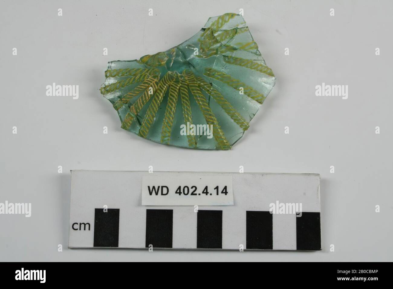 glass fragments, 11 fragments of the bottom of a dish with reticella decoration, glued together (1988 still consisting of only 4 fragments t.p.v 11, cf. Baumgartner Stock Photo