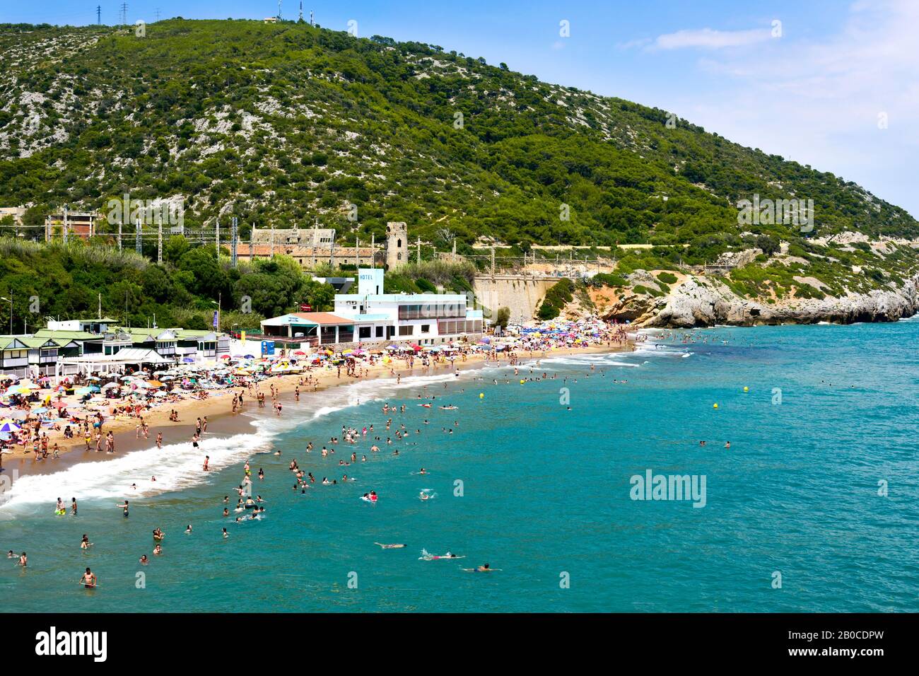 SITGES, SPAIN JULY 9, 2017 People enjoying, relaxing, sunbathing or
