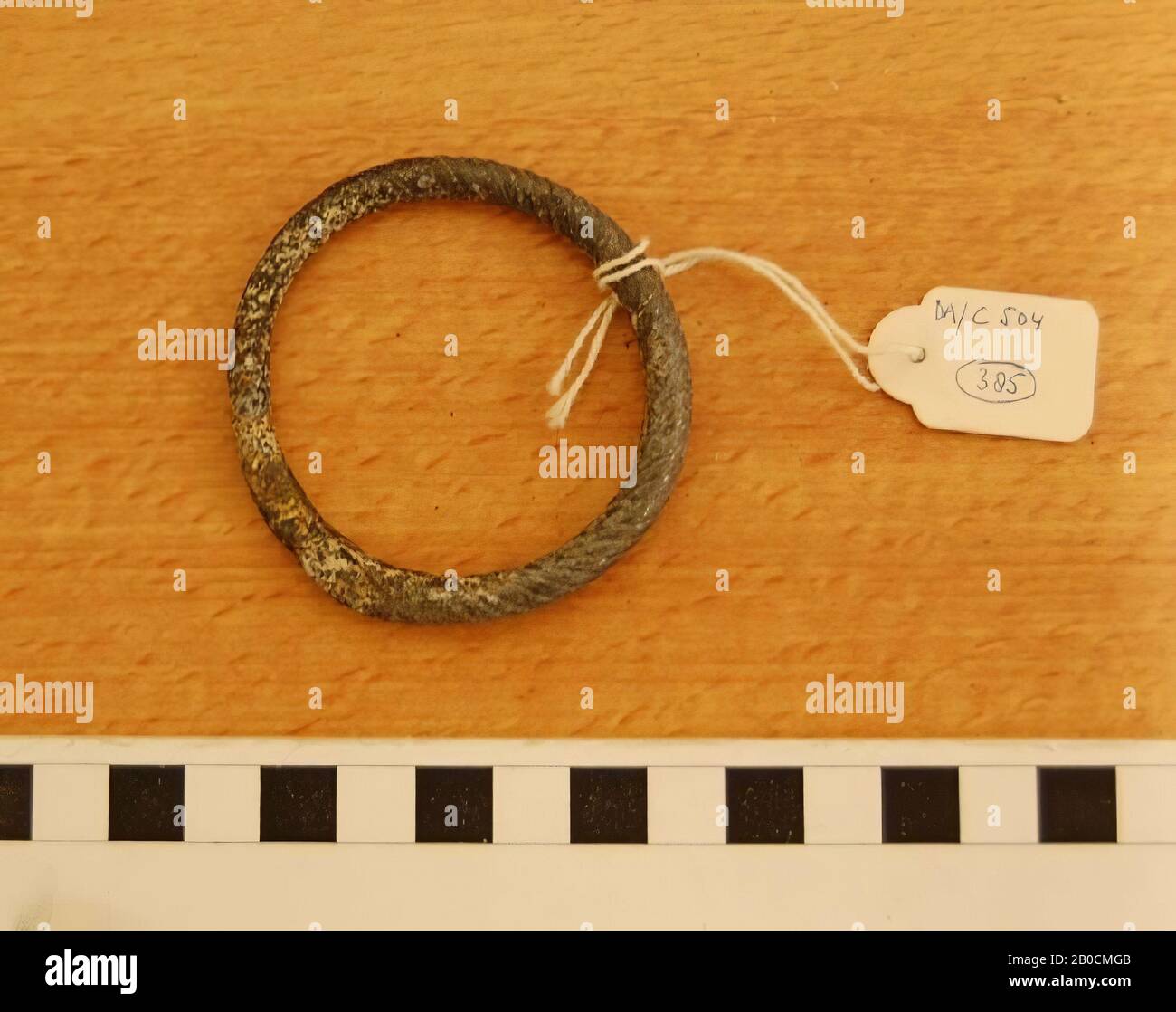 Glass hair, arm or anklet, twisted, grave inventory, ornament, glass, black, D 6.1 cm, thickness 0.7 cm, Islamic Period 1250-1600 AD, Jordan Stock Photo