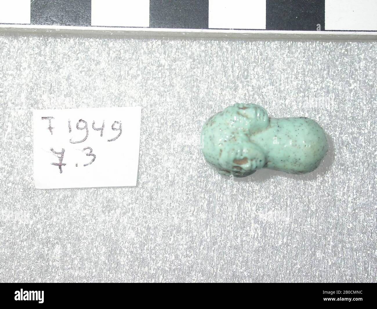 head, prisoner of war, 4 pieces, amulet, person, faience, 2,3 cm, Late Period, Saitian Period, Egypt Stock Photo