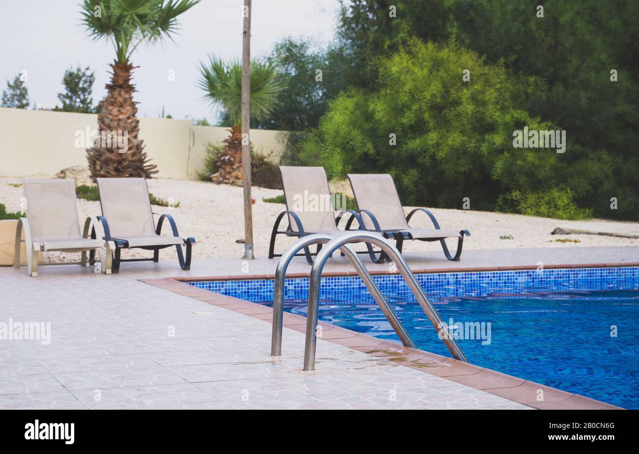 Outdoor swimming pool at summer time Stock Photo Alamy