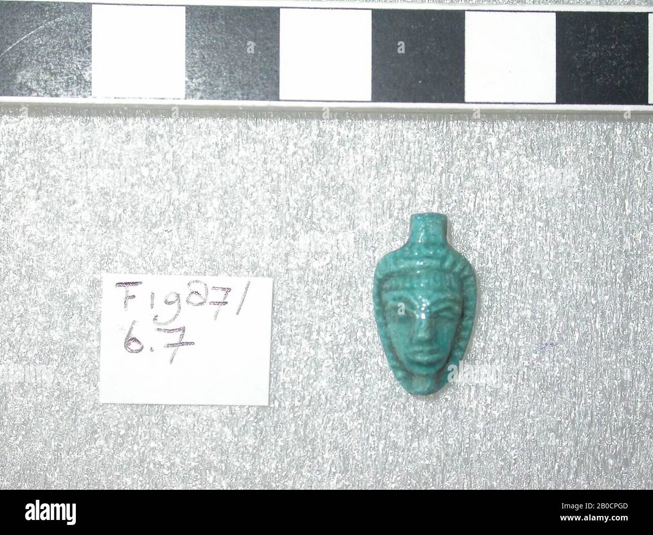 head, headscarf, forgery, faience, 2 x 1.1 cm, modern, Egypt Stock Photo