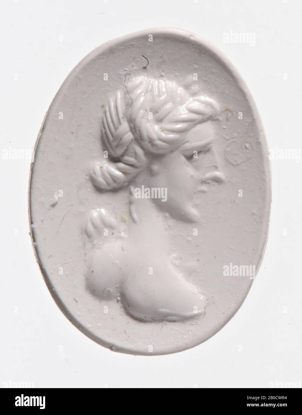 Vz: she has a long face and neck, the hair is rolled around her head and another roll to the crown of the head, in the hair a diadem or wreath, a small wing is visible behind Victoria's shoulders. , gem, intaglio, ringstone, carnelian, Color: light orange semi-transparent, Shape: oval, Machined: Maaskant-Kleibrink, M., Catalog of the engraved gems in the Royal Coin Cabinet, 1978, p.60, fig.2, type F1A , front convex, Method: shallow modeling with large fairly round, 16.5 x 12.5 mm, D. 4 mm, 1st century BC. -100 Stock Photo