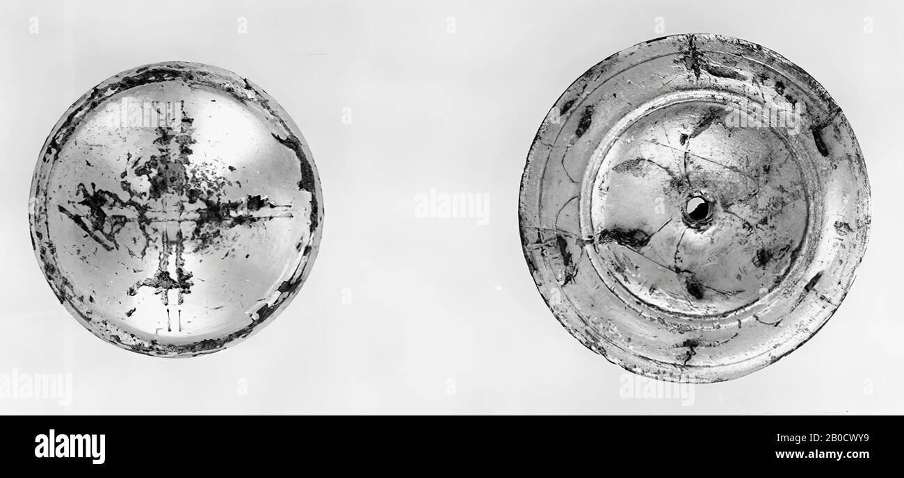 Small Disc Of Silver Plated Bronze Cast In One Piece Front In The Middle A Concave Field Around It An Engraved Groove Then A Border First Convex Than Concave Enclosed By A Quarry