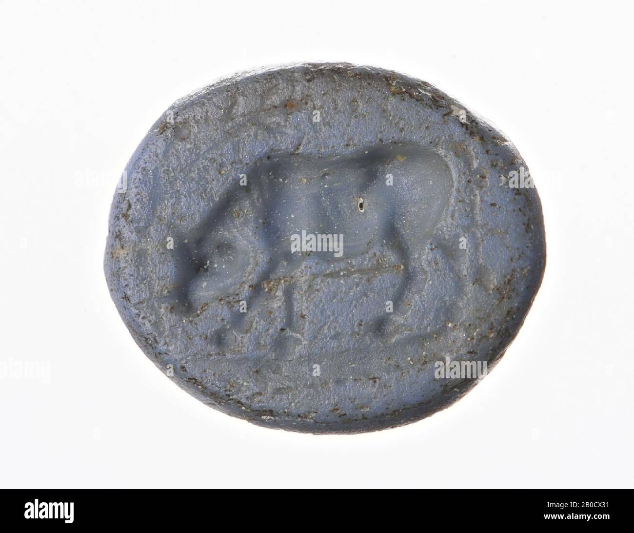 Vz: grazing cow., Gem, intaglio, ringstone, glass paste, Color: blue-gray, Shape: oval, Processing :, Style: body modeling with rounded drills, detailing not clear., 10 x 9 mm, D. 2 mm, end of the 1st century BC. - early 1st century AD. -25 BC Stock Photo