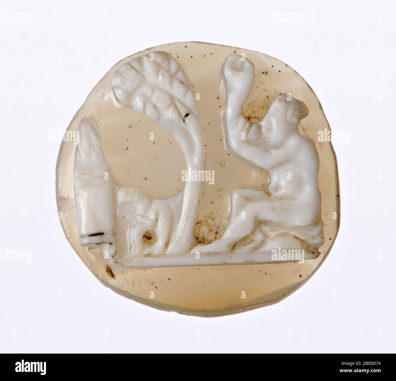 Vz: Cupid? playing on trumpet, seated to the left, in front of him is a left bent tree, next to it altar and unknown object, ground line, cameo, sardonyx, 2 layers, Color: white Stock Photo