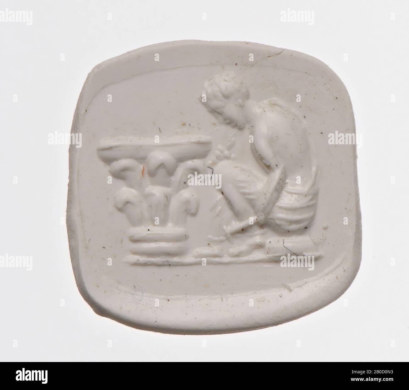 Vz: sculptor crouched to the right, working on corinthian capital, baseline, gem, intaglio, carnelian, Color: brown, Shape: rectangular, horizontal, Processing: in gold ring, Type: 8 x 9 mm, D 1.5 mm, wt. 12.36 gr., 18th century 1700-1800 Stock Photo