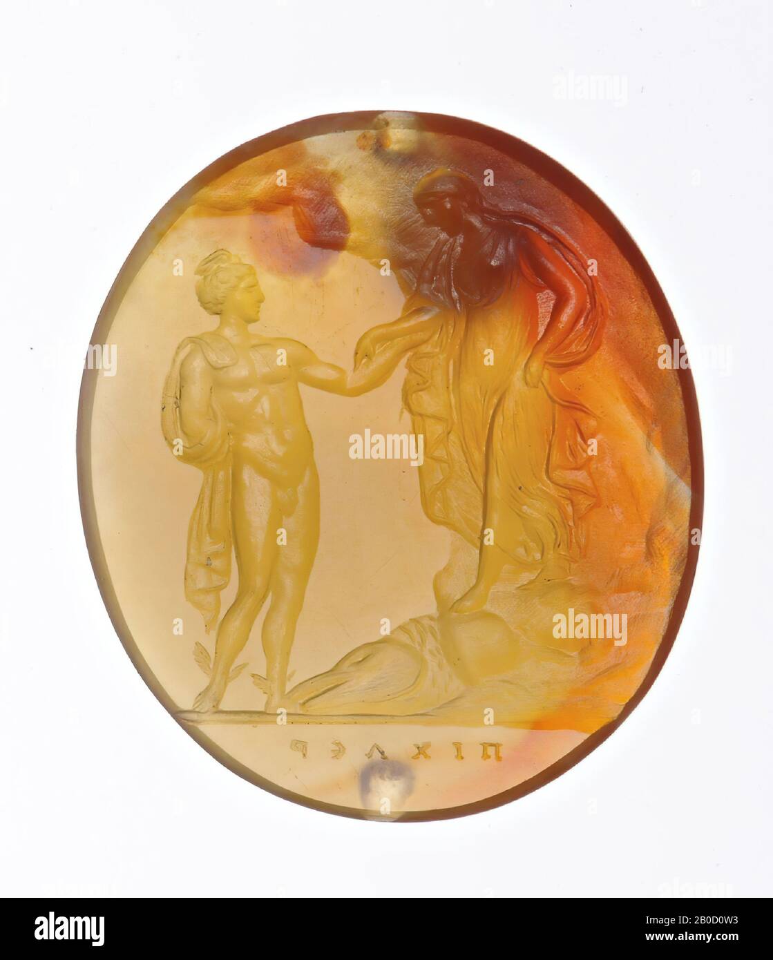 Vz: Perseus standing to the right, he reaches hand to Andromeda, who comes from rock, on the ground the defeated monster, gem, intaglio, carnelian, Color: yellow Stock Photo