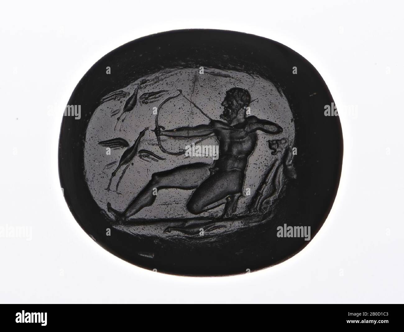 Vz: Herakles on one knee to the left, arching on Stymphalian birds, gem, intaglio, glass, Color: black, Shape: oval, lying, Processing:, Method:, 17 x 21 mm, D. 5 mm, wt. 2.99 gr., 18th century 1700-1800 Stock Photo