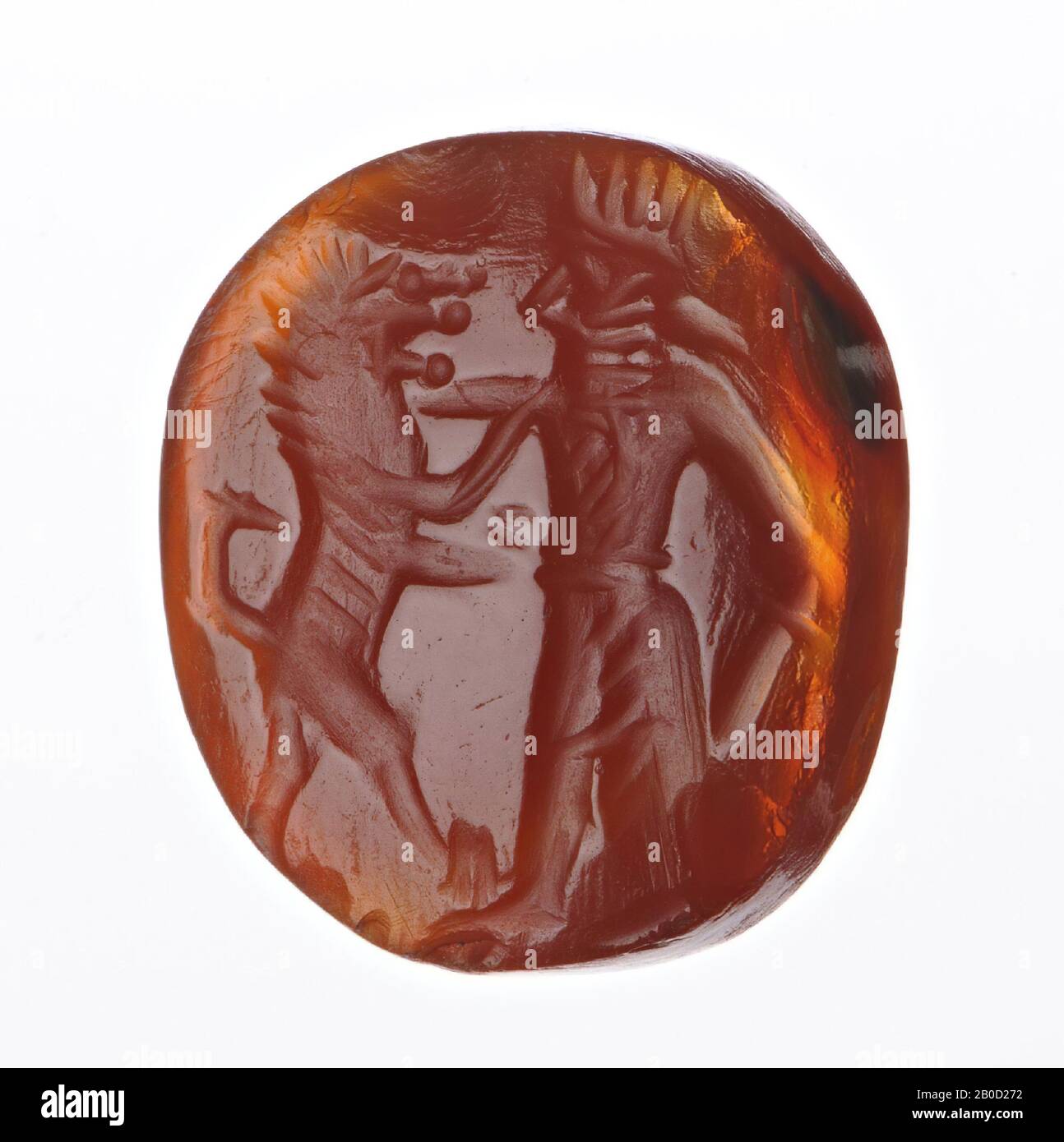F: King standing to the left fighting with lion, standing on his hind legs to the right, gem, intaglio, carnelian, Color: orange, Shape: oval, wide, standing, Processing:, Method:, 17 x 15 mm D. 4.5 mm, wt. ? gr., 4th century AD. 300-400 AD Stock Photo