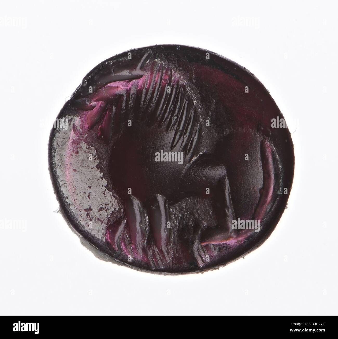 Vz: lion sitting on hind legs to the left, gem, intaglio, garnet, Color: purple-red, Shape: oval, lying, Processing:, Method: 9 x 10 mm, D. 2 mm, wt. ? gr., 4th - 6th century AD. 300-600 AD Stock Photo