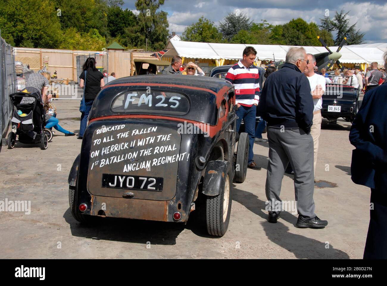 Rear view of modified 1948 Morris 8 car, with dedication on the back, on display at small local motor show Stock Photo
