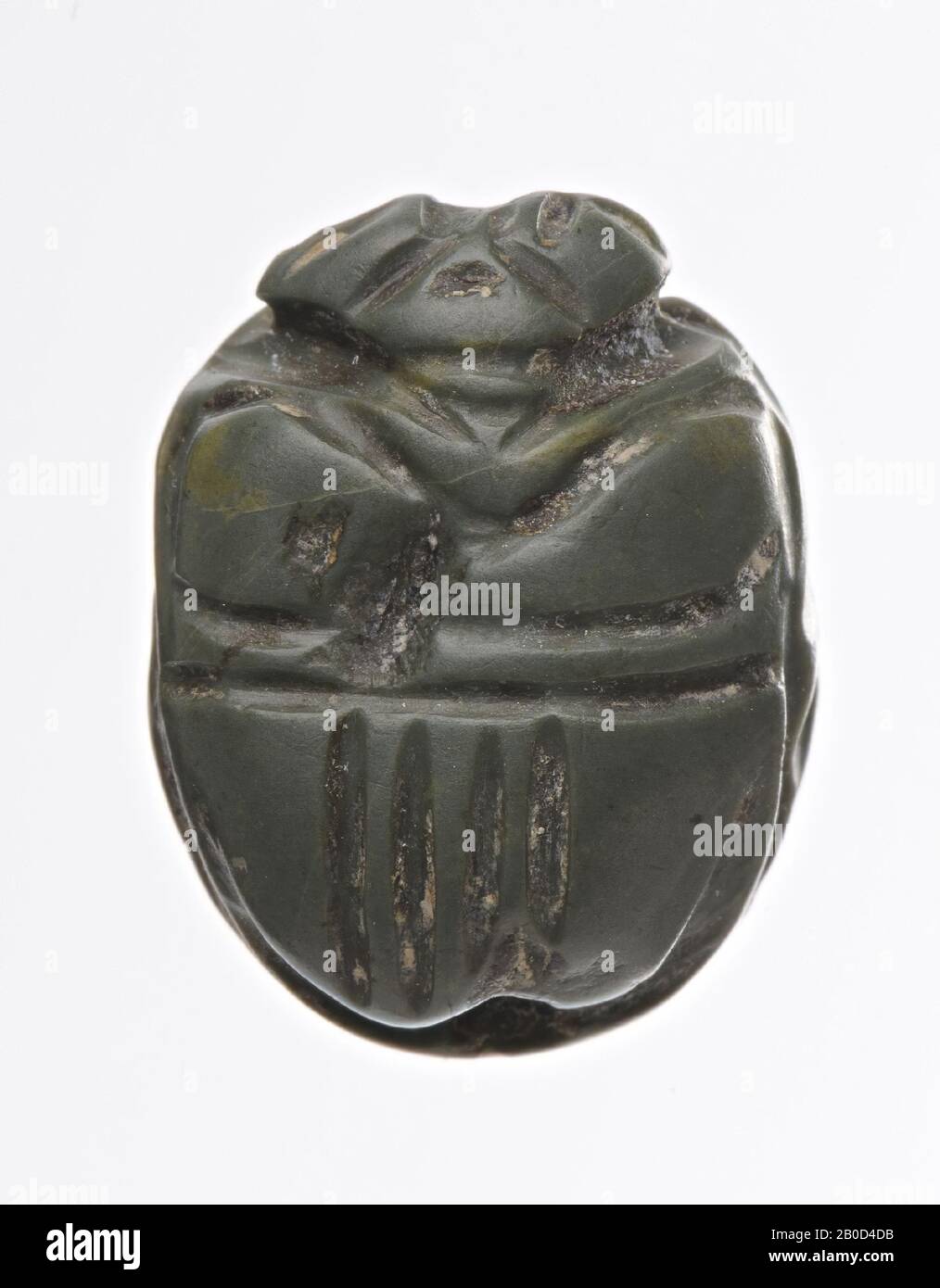hieroglyphic text, stamp seal, stone, Color: green, Shape: scarab, Machining :, Type :, 6 x 15 x 12 mm Stock Photo