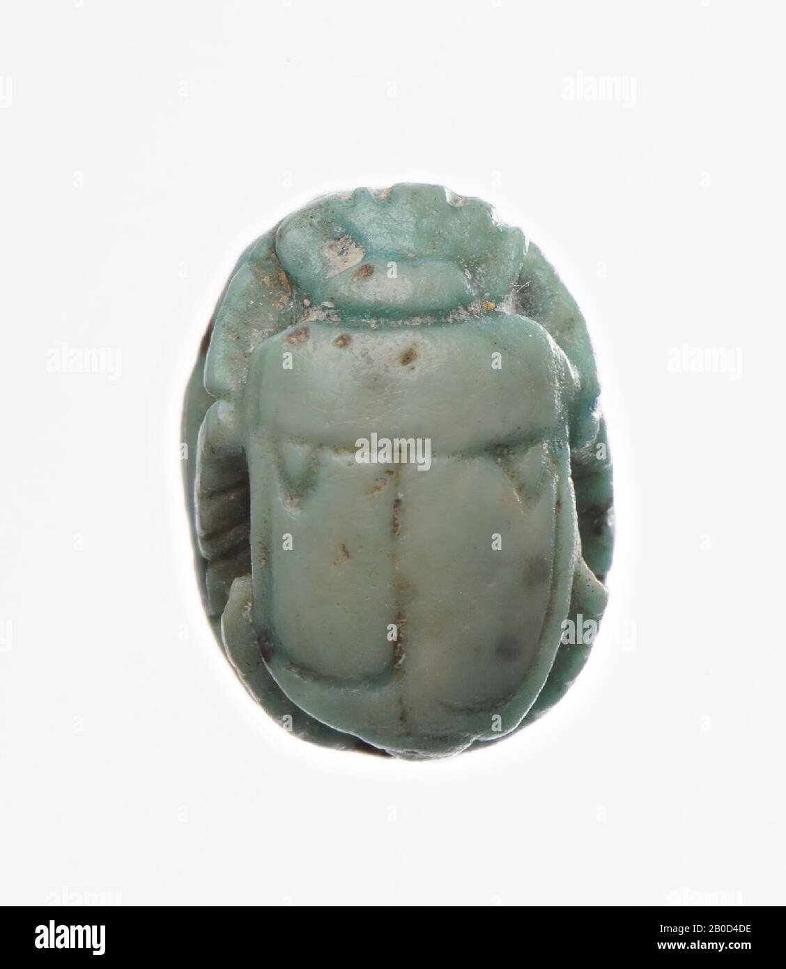hieroglyphic text, stamp seal, stone, Color: green, Shape: scarab, Machining :, Style: 4 x 6 x 5 mm Stock Photo