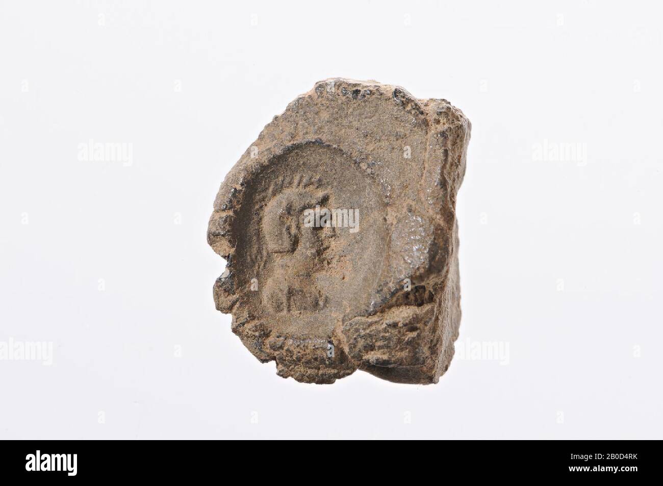 head of man with helmet to the right, clay seal, dried clay, Color: anthracite, Shape: oval (intaille), convex, Processing:, Method of manufacture:, 8 x 6 mm, end of Hellenistic period, Turkey Stock Photo