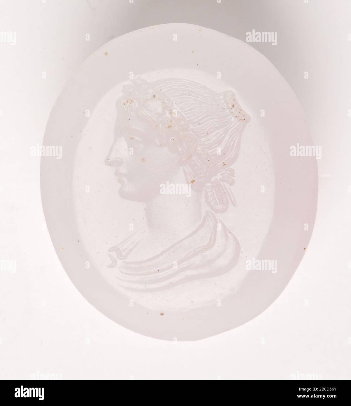 Vz: the woman has a detailed hairdress in which a wreath of curls is turned around her head, she wears a robe covering her shoulders., Gem, intaglio, unknown, Color: white pink, Shape: oval, Processing: edge at the rear slightly cut back compared to front, 15 x 18.5 x 3 mm Stock Photo