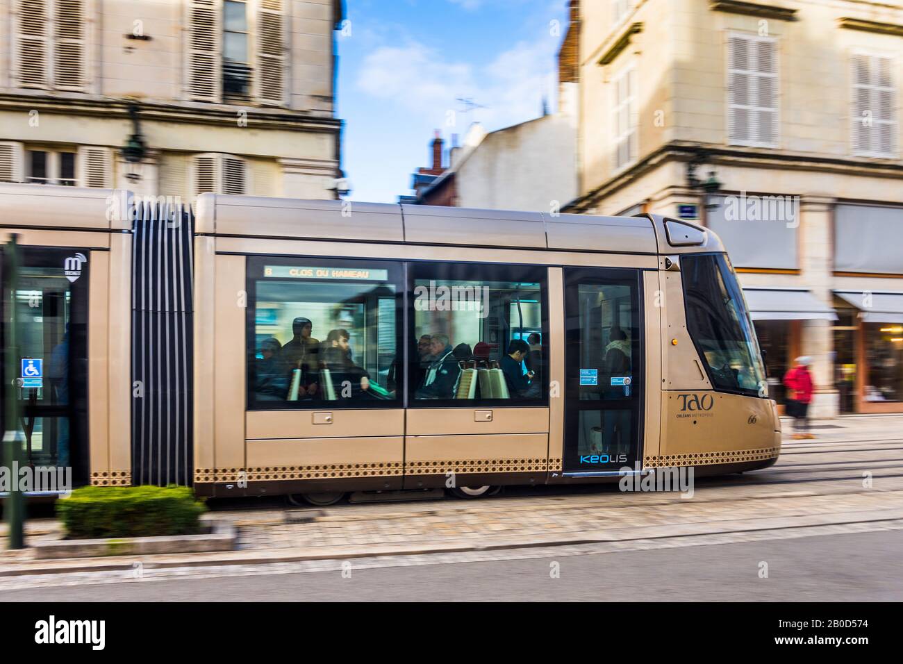Alstom Citadis 302 tram on Rue Jeanne d'Arc, Orleans, Loiret, France. Stock Photo