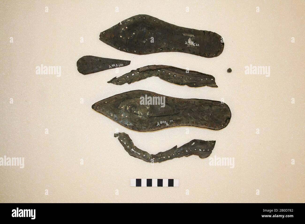 Parts of a ladies (?) leather shoe. The sole is studded along the edge with iron nails with large round heads. In the middle the nails form the letters S., shoe sole, organic, leather, metal, iron, l: 24 cm, br: 7 cm, roman, Netherlands, South Holland, Leidschendam-Voorburg, Voorburg, Arentsburg Stock Photo