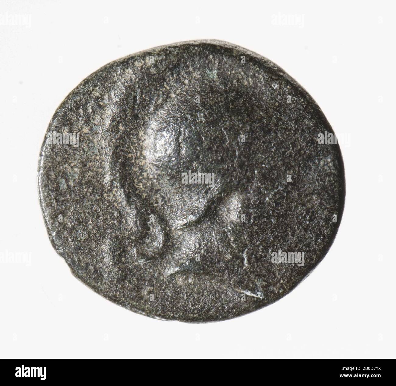 Obverse: Bust of Athena, right, with crested helmet. Worn out. Reverse: Apollo, standing, arrow in left hand and with right resting on arch. Worn, remains of Greek inscription., Coin, of Seleukos I, metal, bronze, diam: 1.6 cm, wt. 2.69 grams, 312-280 BC, unknown Stock Photo