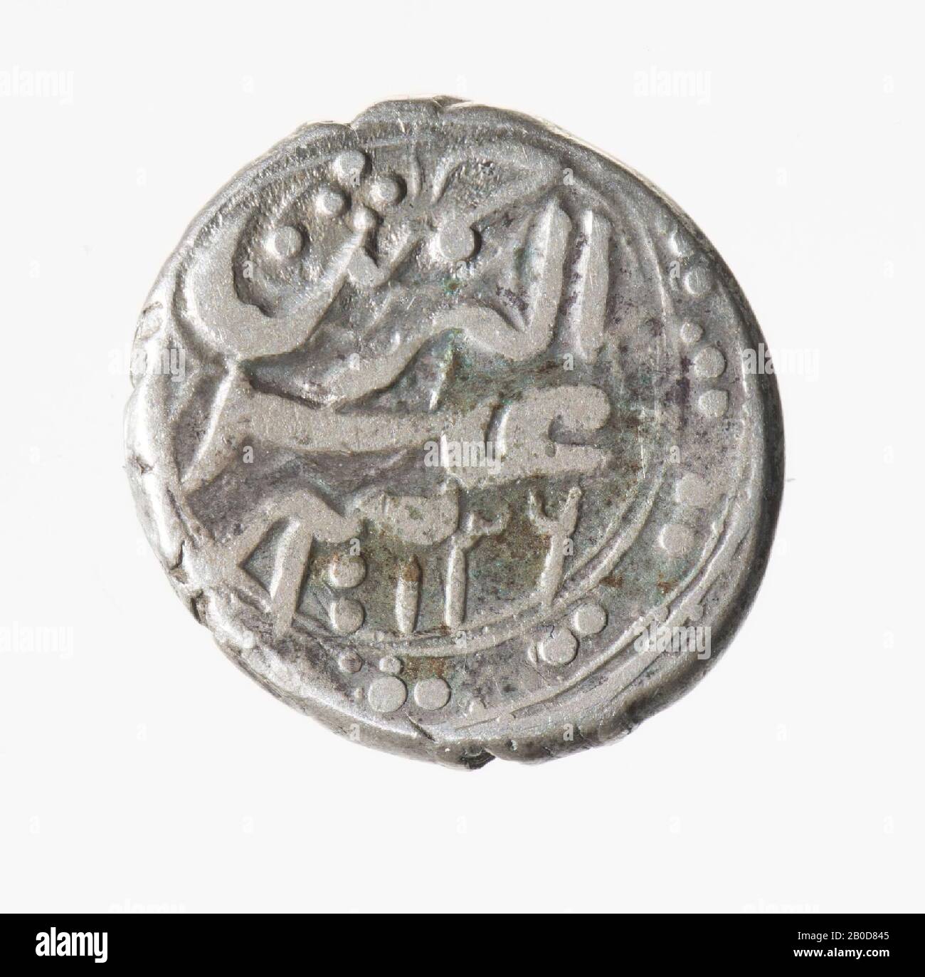Both sides: Inscription, surrounded by border with double dots. Skew, mint, Arabic? Persian, metal, silver, diam: 1.6 cm, wt. 4.53 grams, unknown Stock Photo