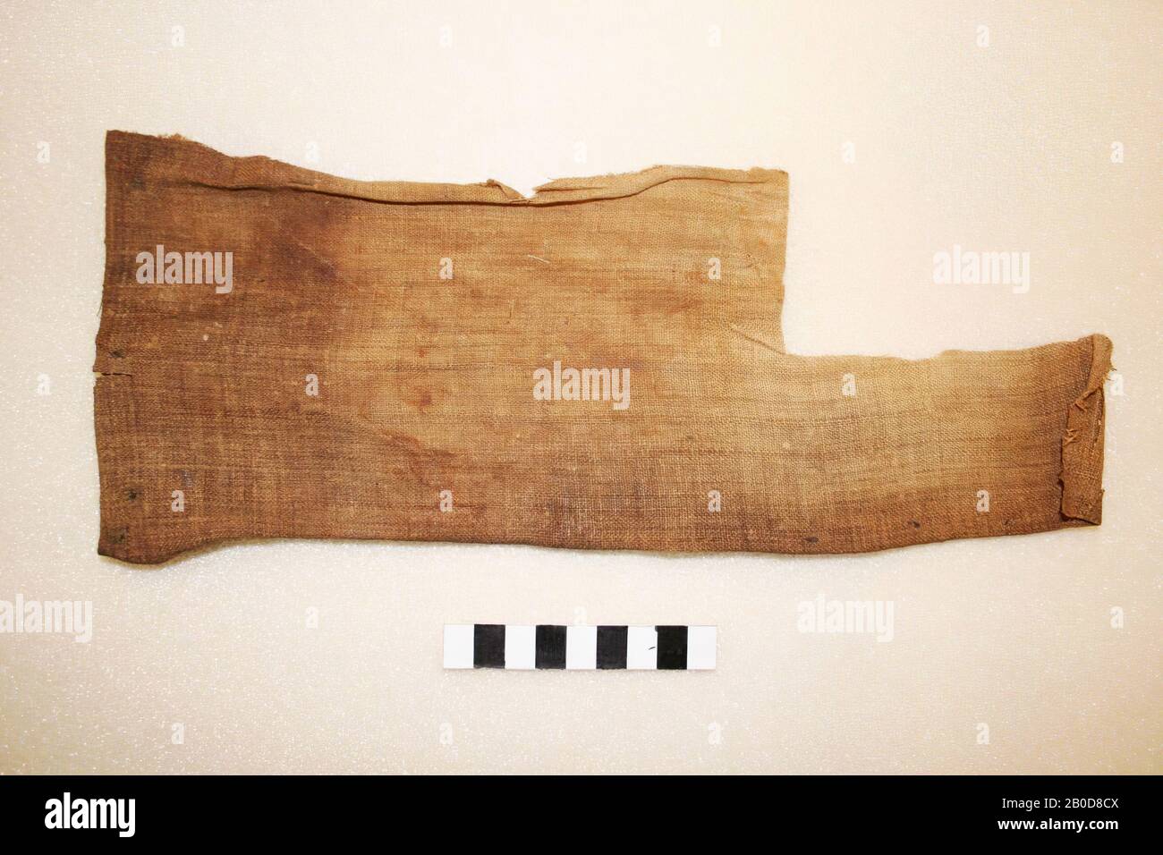 Fragment of a mummy wrap, with a corner cut out, upholstery, fabric