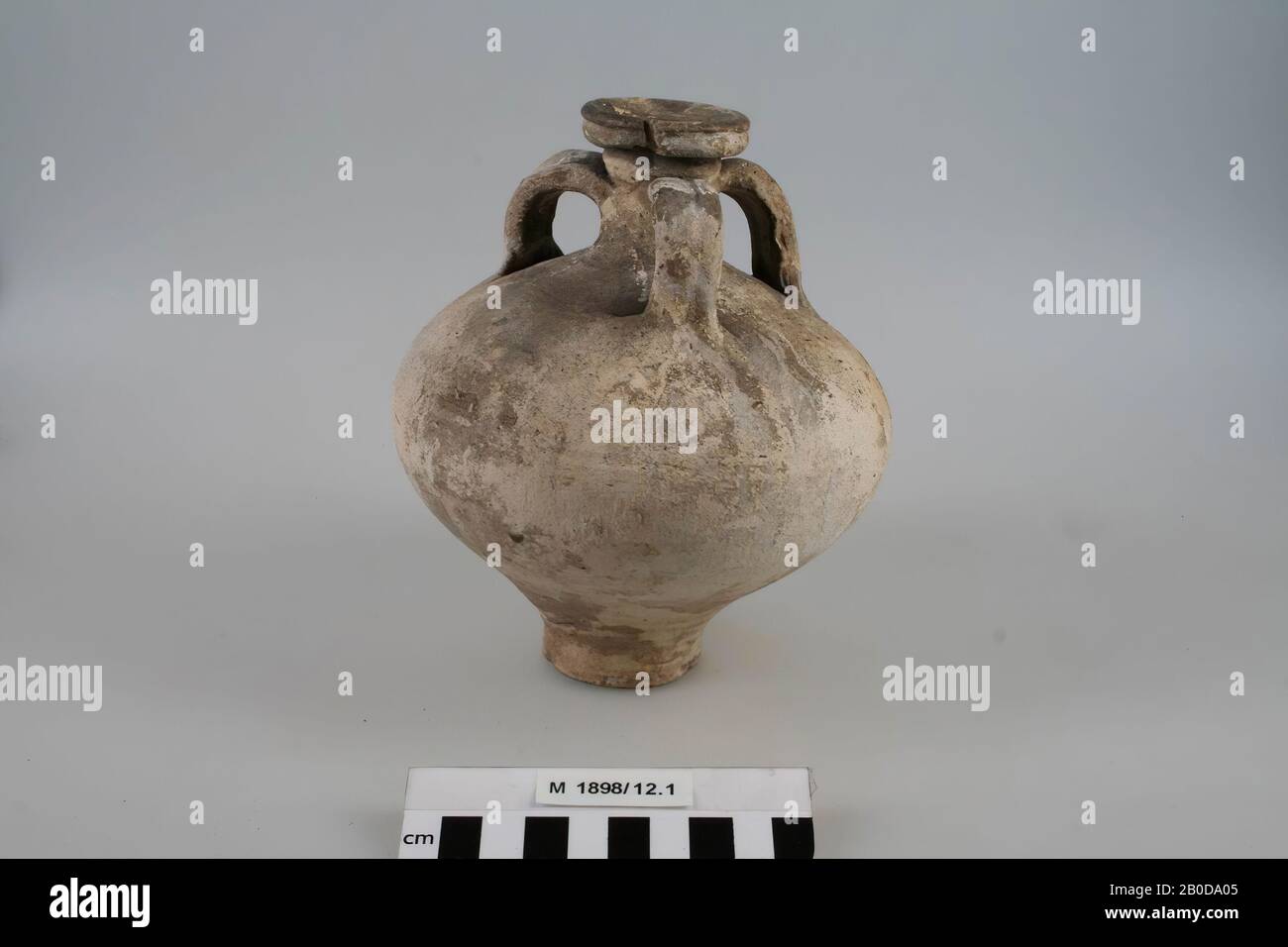 Jar on narrow foot with three ears. Part mouth adhered, surface fragile and let loose here and there., Jug, pottery, h: 16.5 cm, diam: 14.5 cm, Germany Stock Photo