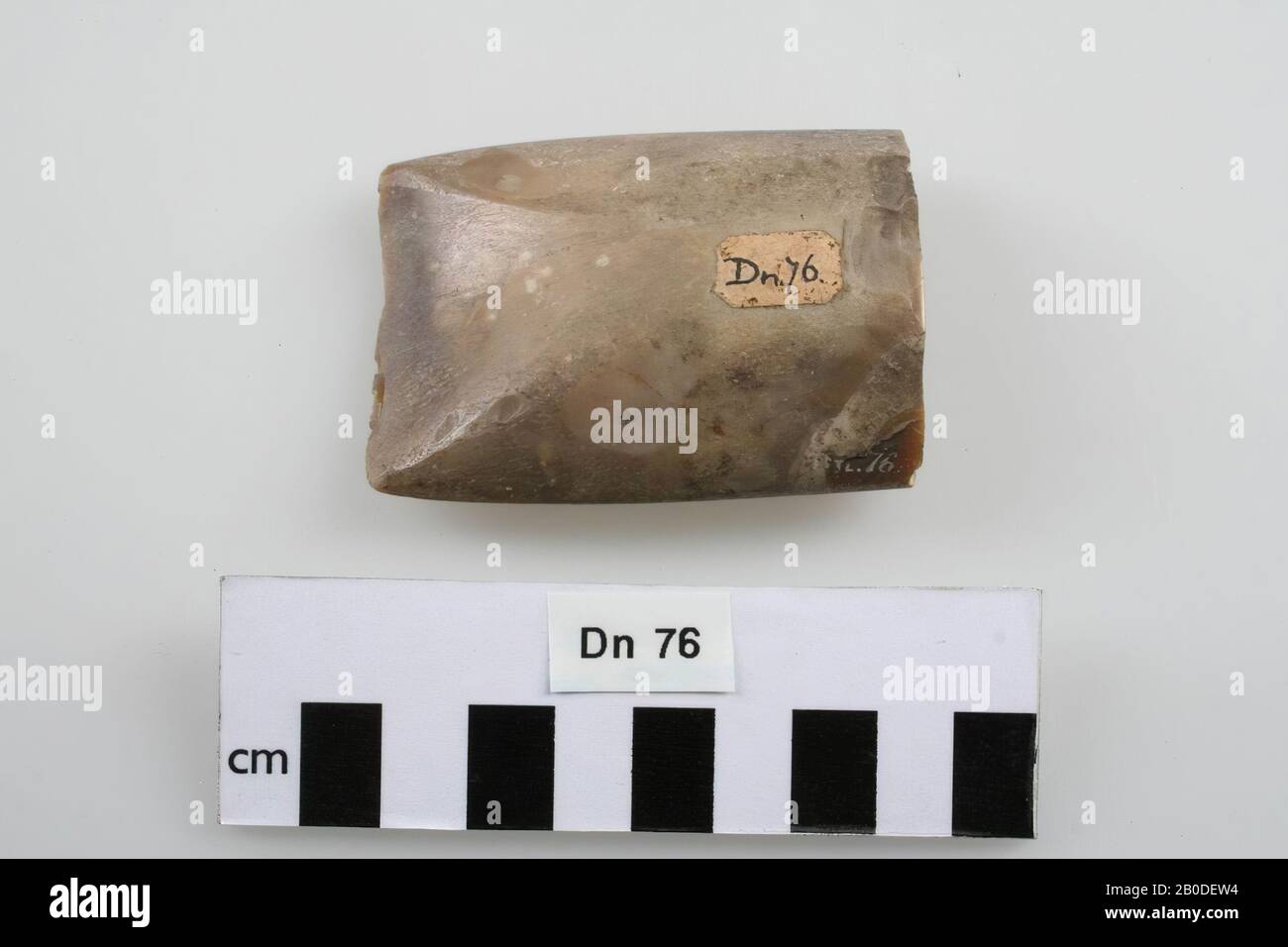 Part of a polished flint gouge. Damage by use, gouge, stone, flint, 1.5 x 5 x 7 cm, prehistoric, Denmark, unknown, unknown, unknown Stock Photo