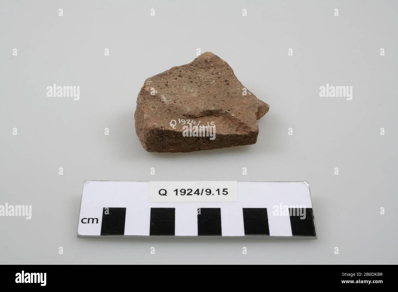 Piece of grindstone, grindstone, stone, 7 x 6,5 cm, prehistory, Belgium, unknown, unknown, Tilice Stock Photo