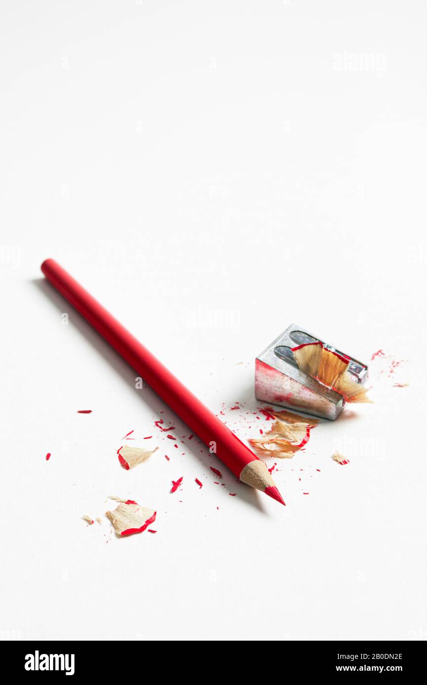 Red pencil and sharpener. Stock Photo