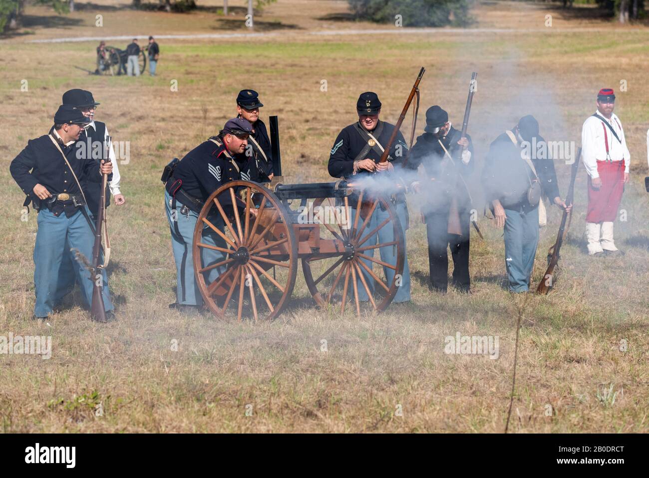 Brooksville, FL - January 18, 2020: Civil War Reenactors fire a Gatling Gun at a historical reenactment in Brooksville, Florida. Stock Photo